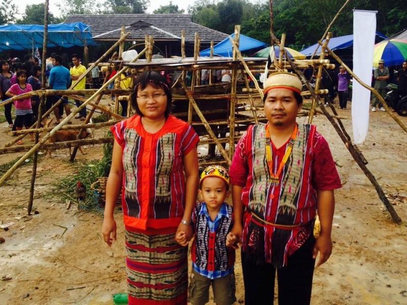 Masrani and his wife and son before the sumpah adat last year. Photo courtesy of Masrani