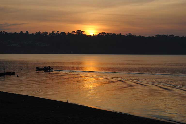 Sunset over the Xingu River. The Belo Monte dam on the Xingu, the proposed Sāo Luiz do Tapajós dam, and six more large dams proposed for the Tapajós basin do more than staunch the flow of once wild rivers, they also bring urbanization and urban problems such as street crime and poverty to once remote areas. Photo by Analita Freitas Duarte licensed under the Creative Commons Attribution-Share Alike 4.0 International license.