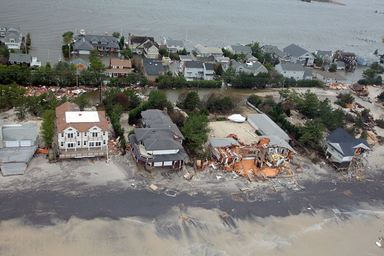 Climate change helped to intensify Hurricane Sandy's impacts, which included disease-causing mold in water damaged homes, and the overwhelming of waste treatment infrastructure which released large amounts of potentially disease-causing raw sewage into streets and homes. Photo courtesy of the US National Guard.