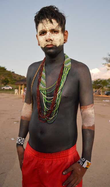 Geovany Krenak, caçique, or chief, of the Krenak indigenous group, wears traditional body paint on a day of celebration. Photo by Zoe Sullivan