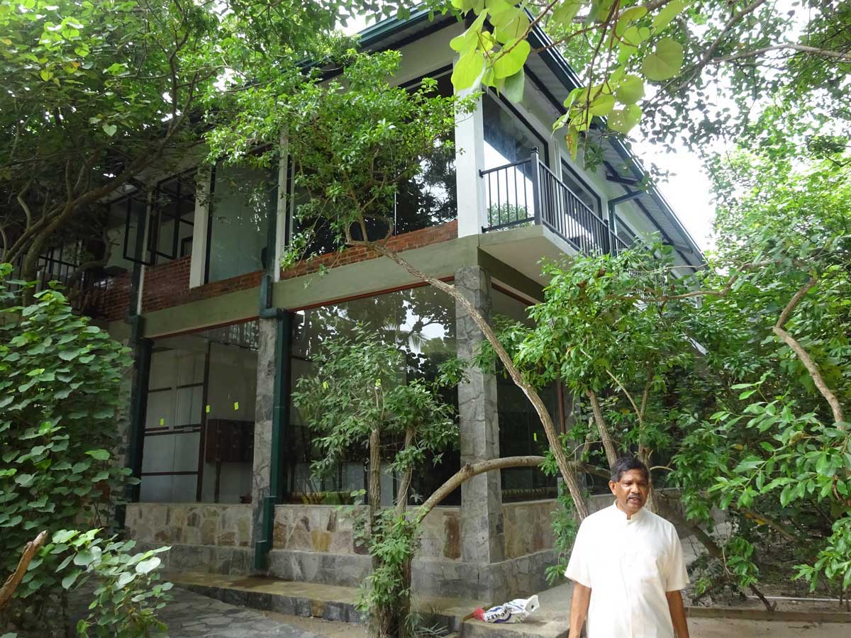 Sudeesa Chairman Anuradha Wickramasinghe stands outside the Seacology-Sudeesa Mangrove Museum. Photo courtesy of Seacology