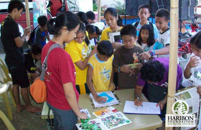 A Haribon booth during the Municipality of Sablayan's Founding Anniversary and Dugoy Festival. The municipality is close to the Siburan forest where a number of threatened species live, including the Mindoro Bleeding-heart dove, the Black-hooded coucal, the Mindoro hornbill, and the Tamaraw, a species of dwarf buffalo. Photo courtesy of the Haribon Foundation