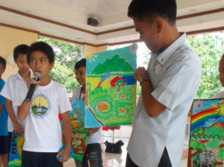 Community engagement is a key component of both BZS’s and Harbon’s work. Poster-making contests are one of the ways Haribon engages communities that surround habitats of threatened species in Mindoro. Photo courtesy of the Haribon Foundation