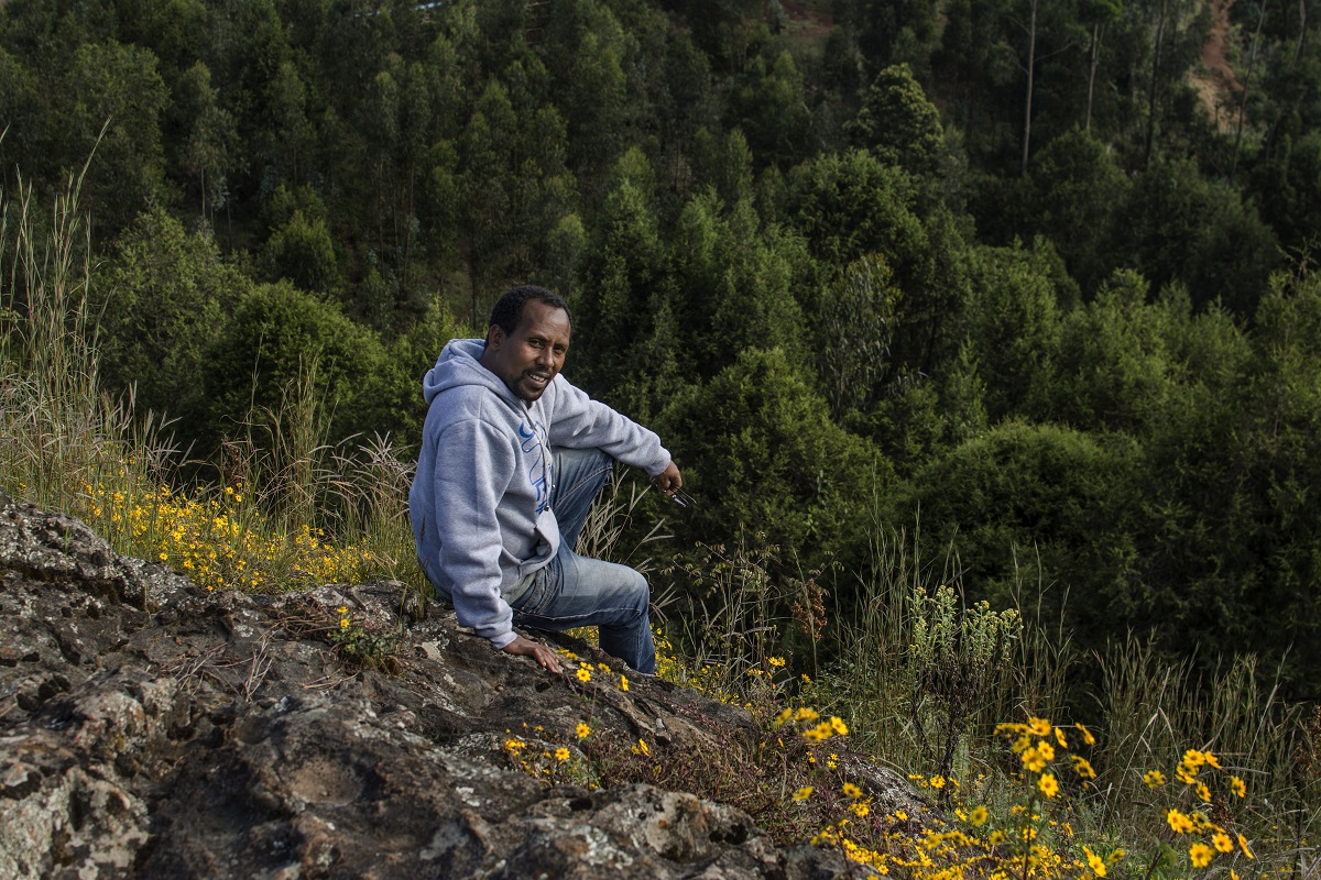 Biologist and botanist Birhanu Belay gained an early love of the natural world as a boy playing by the river and in the forests. Photo by Maheder Haileselassie Tadese for Mongabay