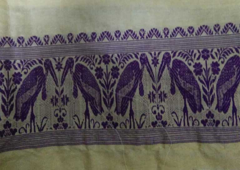 Traditional Assam silk textile with stork motif. Photo by Purinima Barman