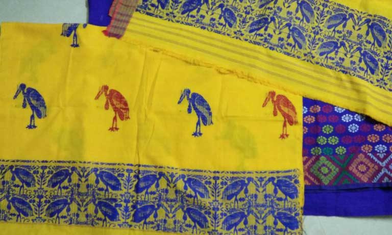 Silk with Greater Adjutant stork motifs. At present, village women have not been able to find a way to market these fine textiles, though it is hoped this could become possible in the future, benefiting both the villagers and the birds. Photo by Purnima Barman