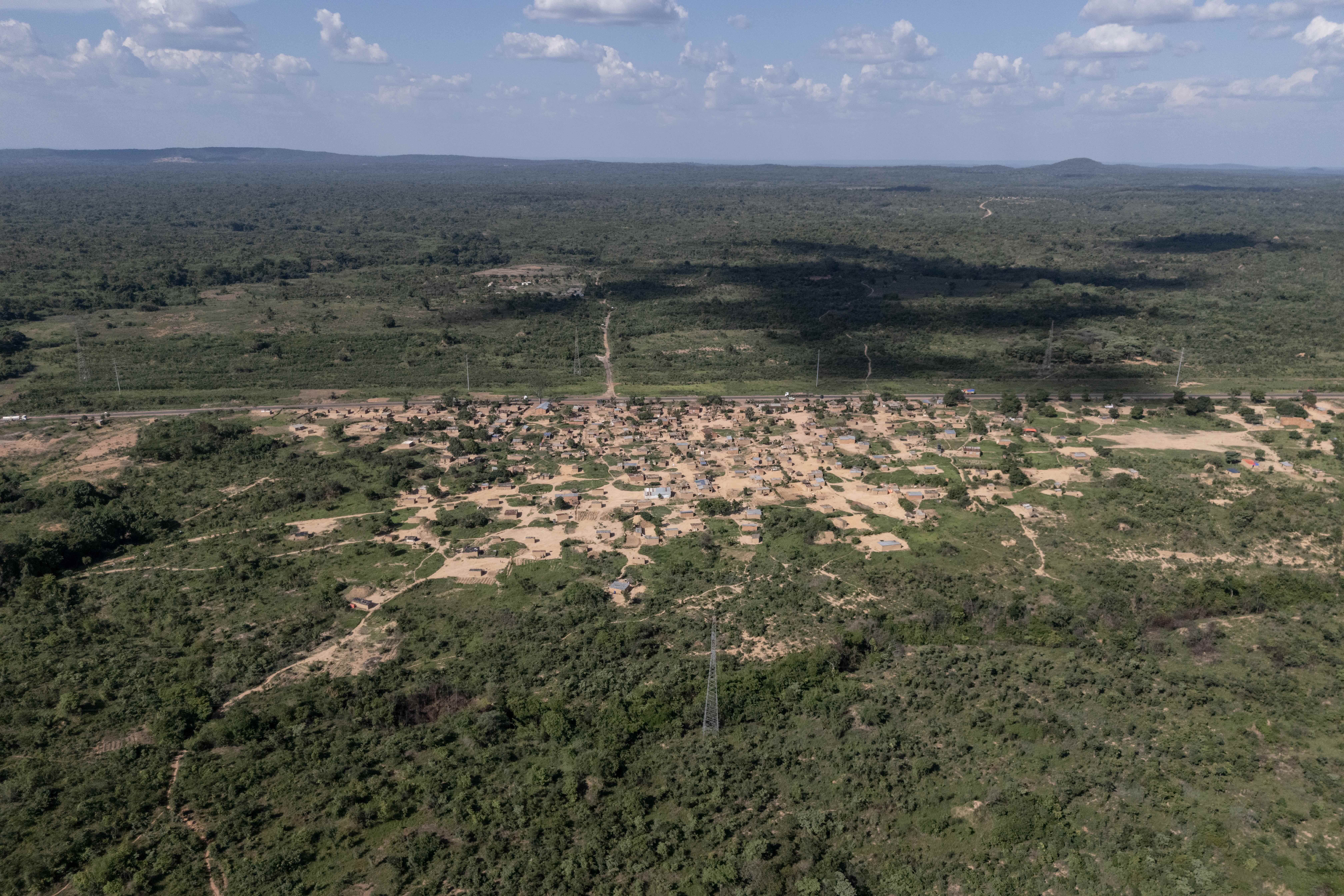 Communities in the Democratic Republic of Congo's copper-cobalt belt worry they could be the next ones evicted by mining companies. Images by Glody MURHABAZI / AFP).